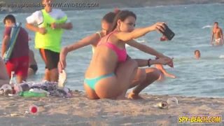 Amateur beach threesome voyeur