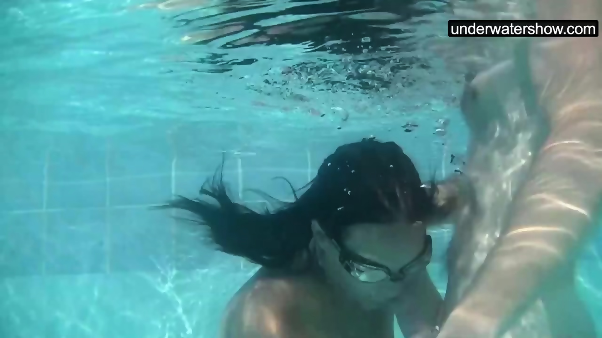 Submerged underwater with a dick inside her