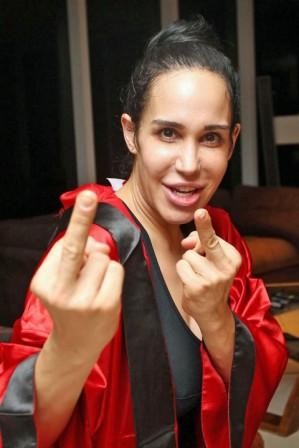 Octomom whipping a guy in a diaper